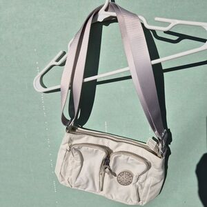 Kipling Cream Crossbody Bag with Gray Strap